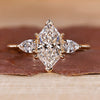 Three diamond engagement ring with dutch marquise centre stone.