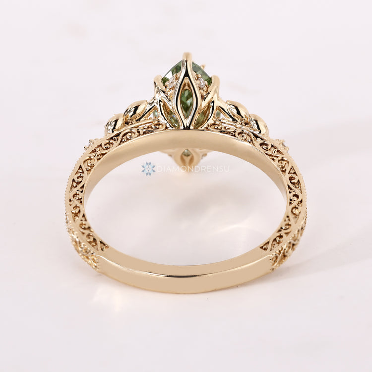 IGI certified marquise cut ring with engraved shank.