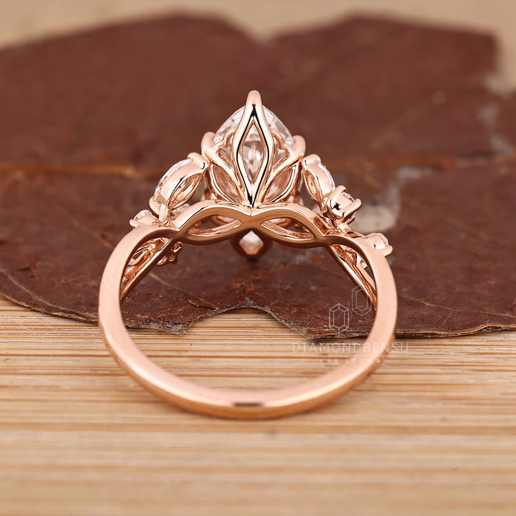 Marquise cut ring with tulip and cathedral setting