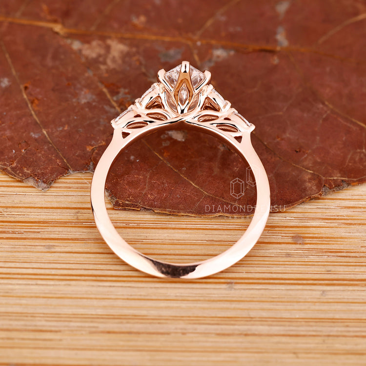 Marquise cut ring with knife edge and tulip setting.
