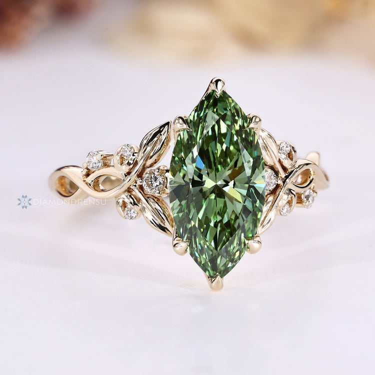 Lab grown diamond ring with six claw prongs.