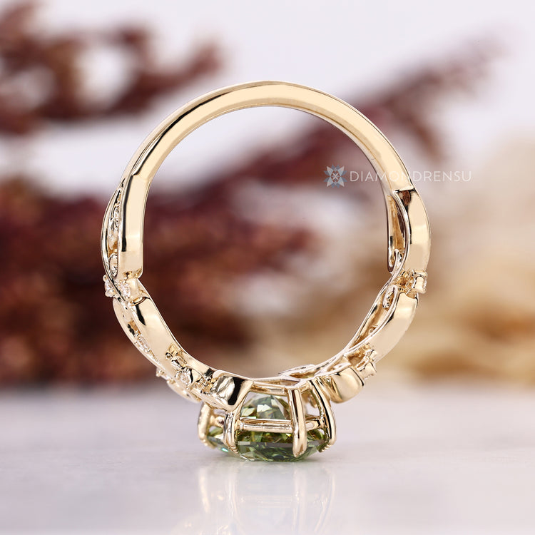 Dutch marquise diamond ring with round side stones.