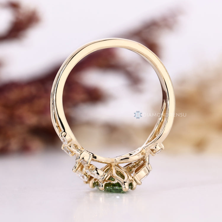 Handmade marquise engagement ring with tulip setting.
