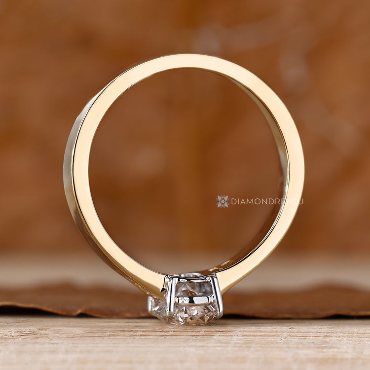 IGI certified oval diamond ring with five stone style.