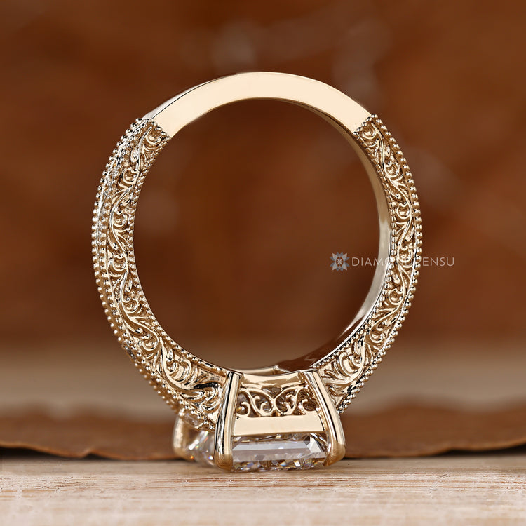 Handmade princess diamond ring with tapered shank.