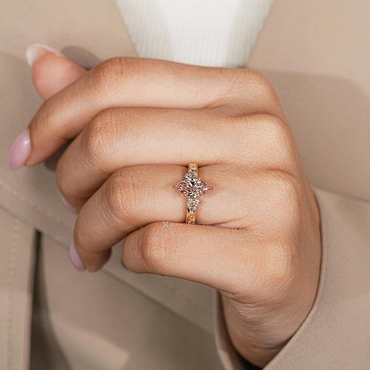 Handmade pink diamond ring with cluster setting.