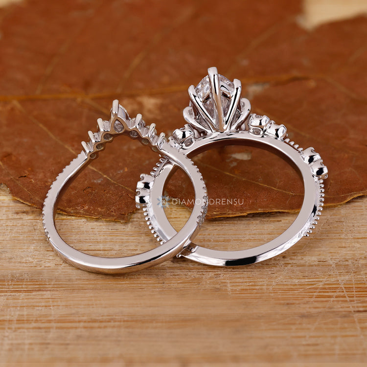 Handmade bridal set with marquise pear and round diamonds.
