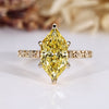 Nature inspired engagement ring with yellow Dutch marquise diamond.