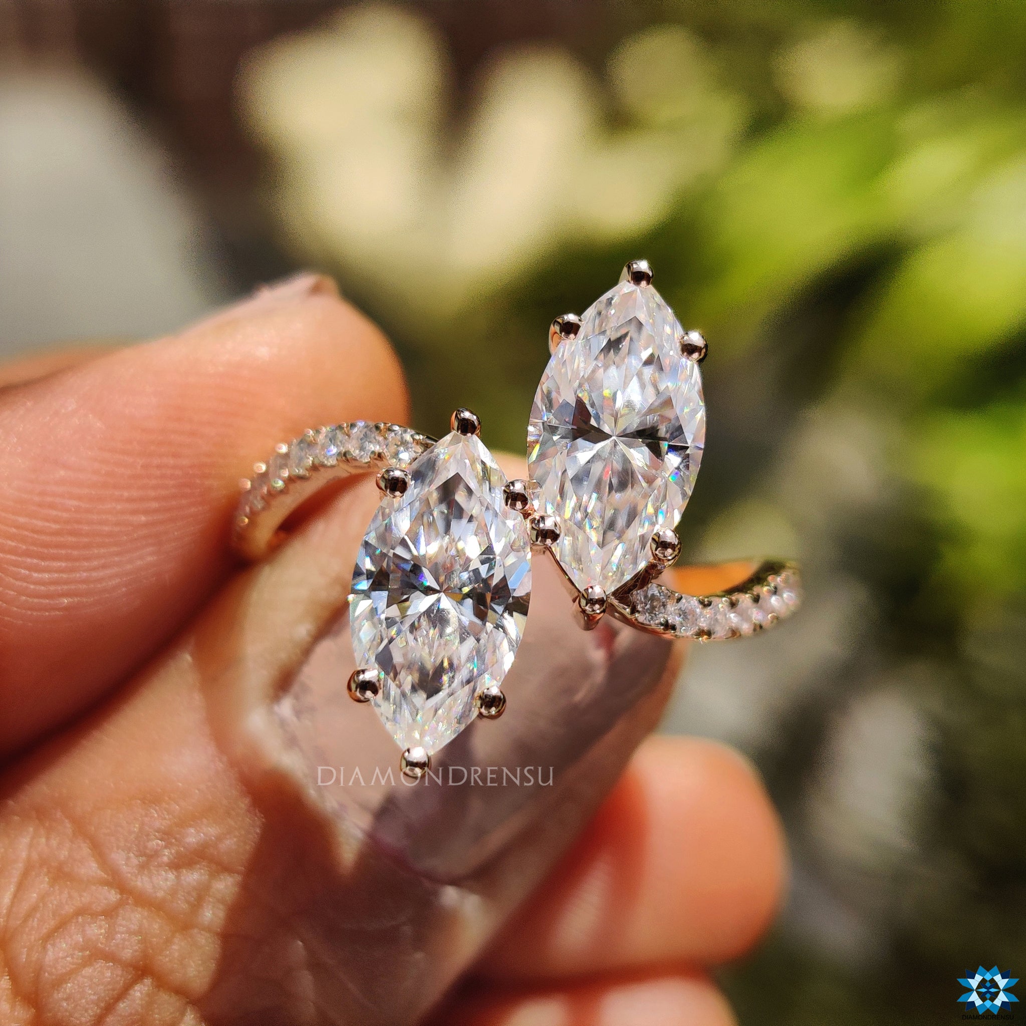 Handmade jewellery featuring two stone design in rose gold finish.
