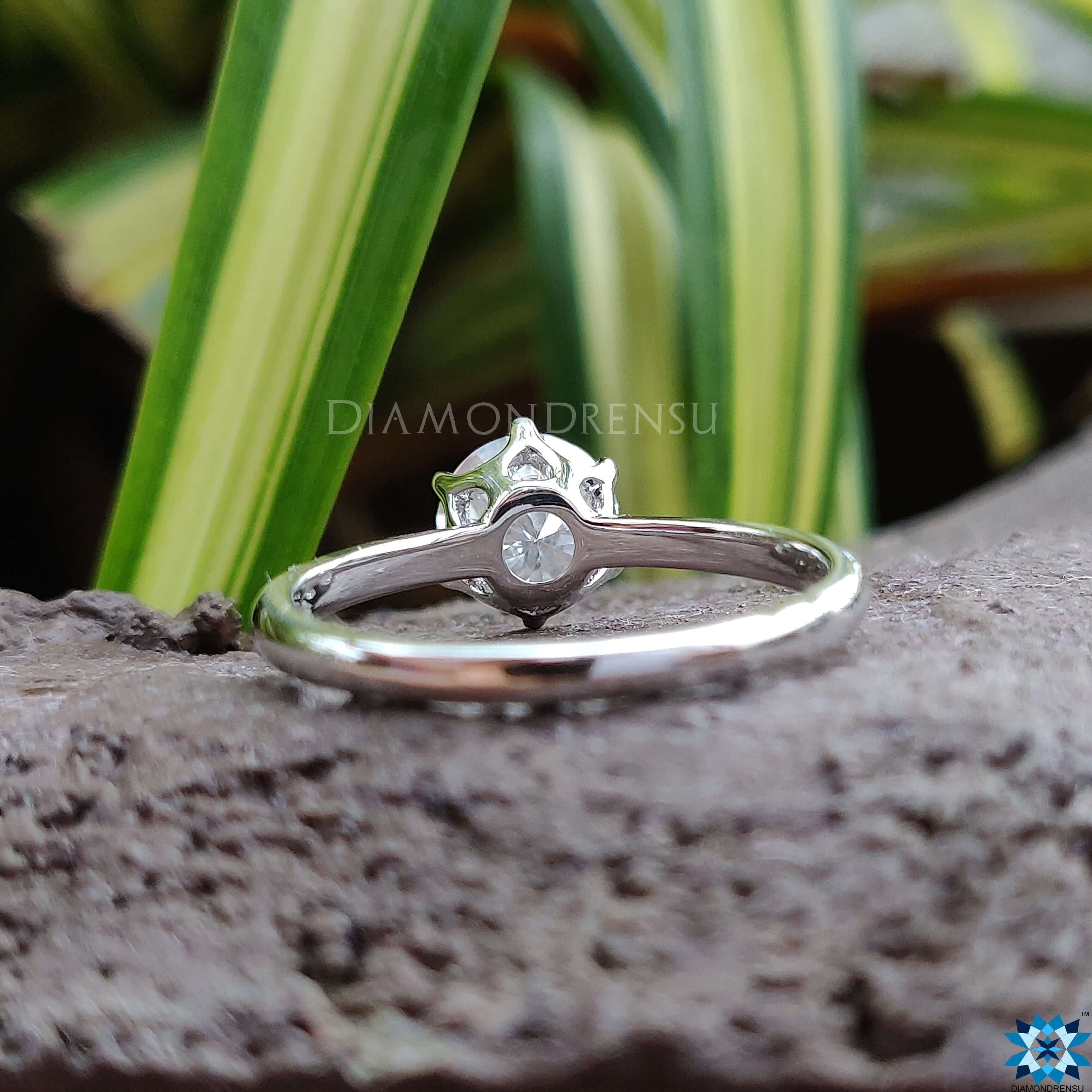 Moissanite for engagement ring set in a stunning round solitaire design.