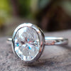 bezel set moissanite engagement ring