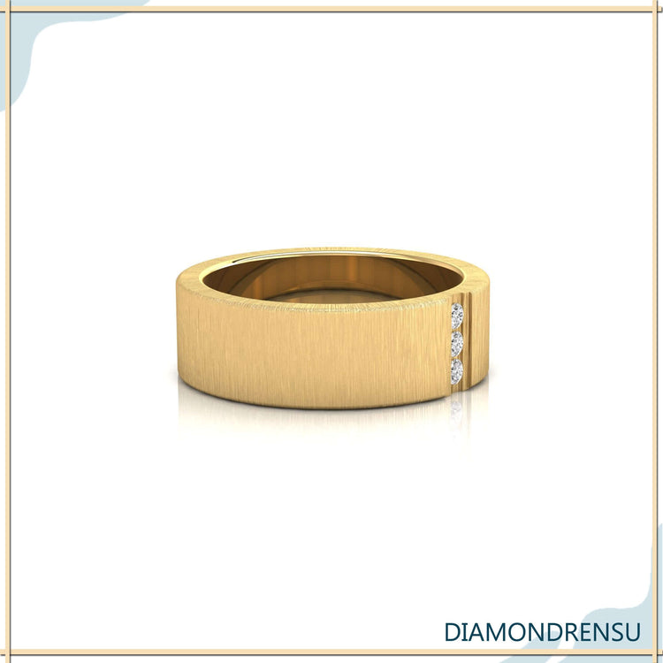 Men's baguette diamond wedding band in brushed finish white gold.
