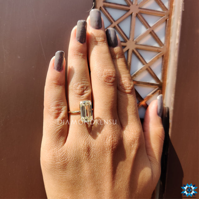 Moissanite engagement ring with a solitaire design and secure prong setting.
