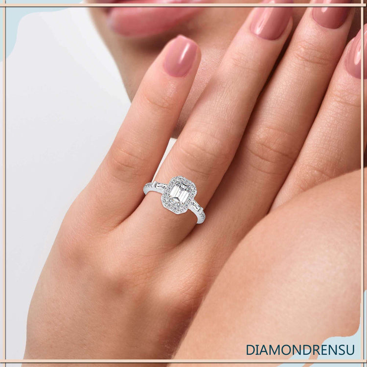 Three stone engagement ring featuring baguette side stones.
