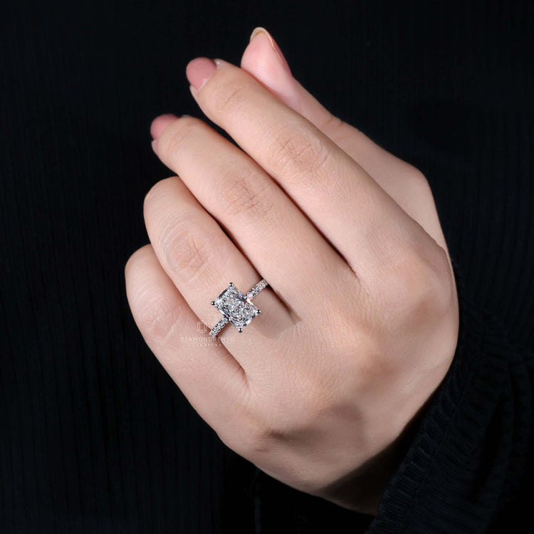 Radiant cut diamond ring with a secure 4 prong engagement ring setting for timeless beauty.
