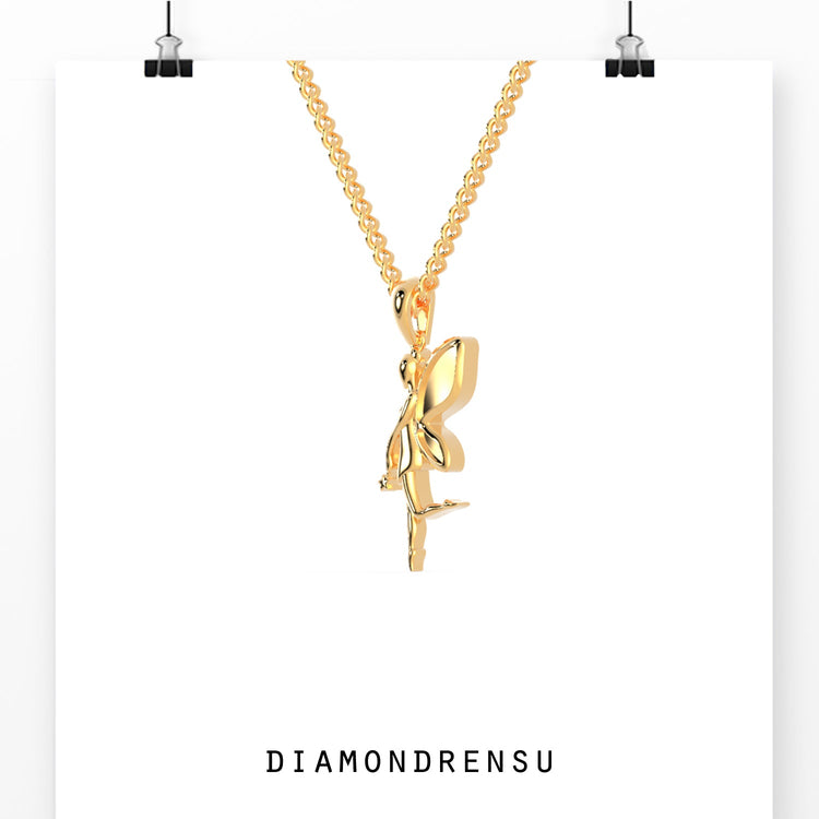 Rose gold angel pendant with sculpted wings.
