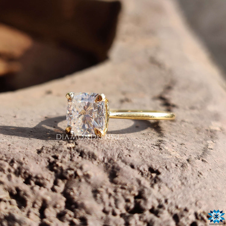 Custom engagement ring with cushion cut moissanite.
