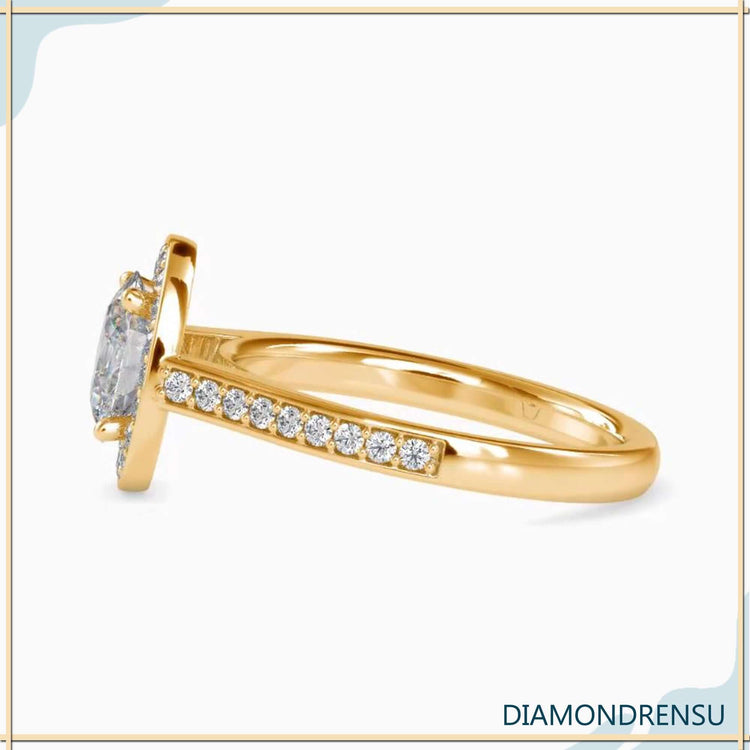 Diamondrensu UK engagement ring with oval halo and custom band.
