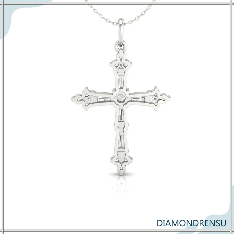 Elegant cross pendant with baguette diamonds in white gold.
