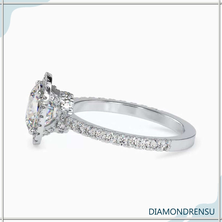 UK diamond ring with round diamond hidden halo.

