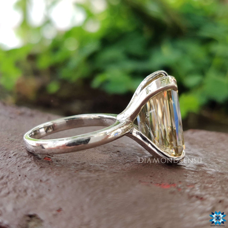 Handmade solitaire ring with yellow moissanite center.
