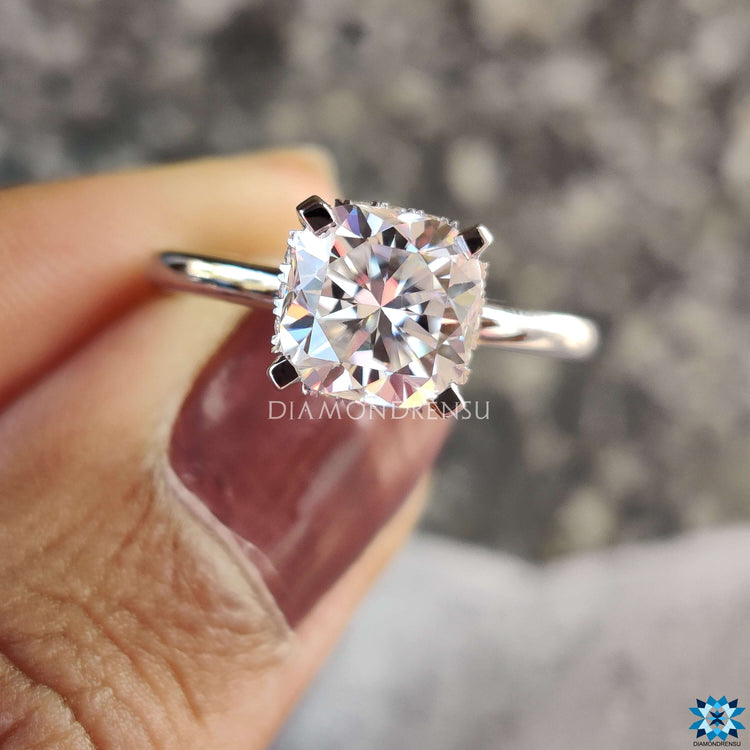 Handmade white gold ring with cushion cut stone.
