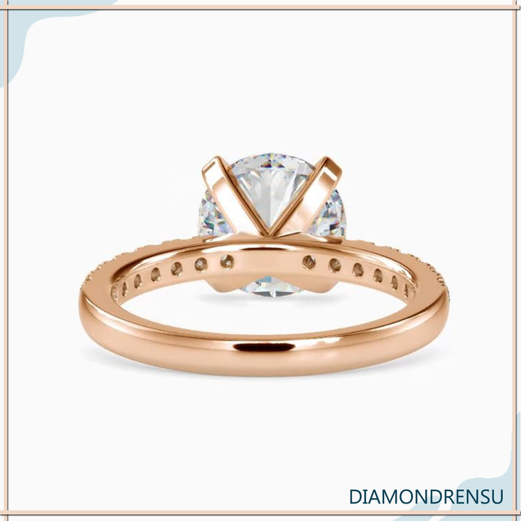 Handmade jewellery UK round engagement ring.
