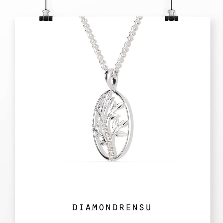 Diamondrensu UK pendant featuring gold tree of life motif.
