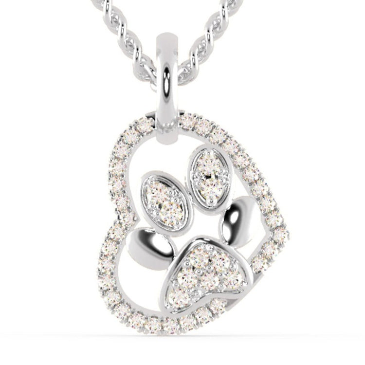 Heart on pendant crafted in white gold with round diamond.
