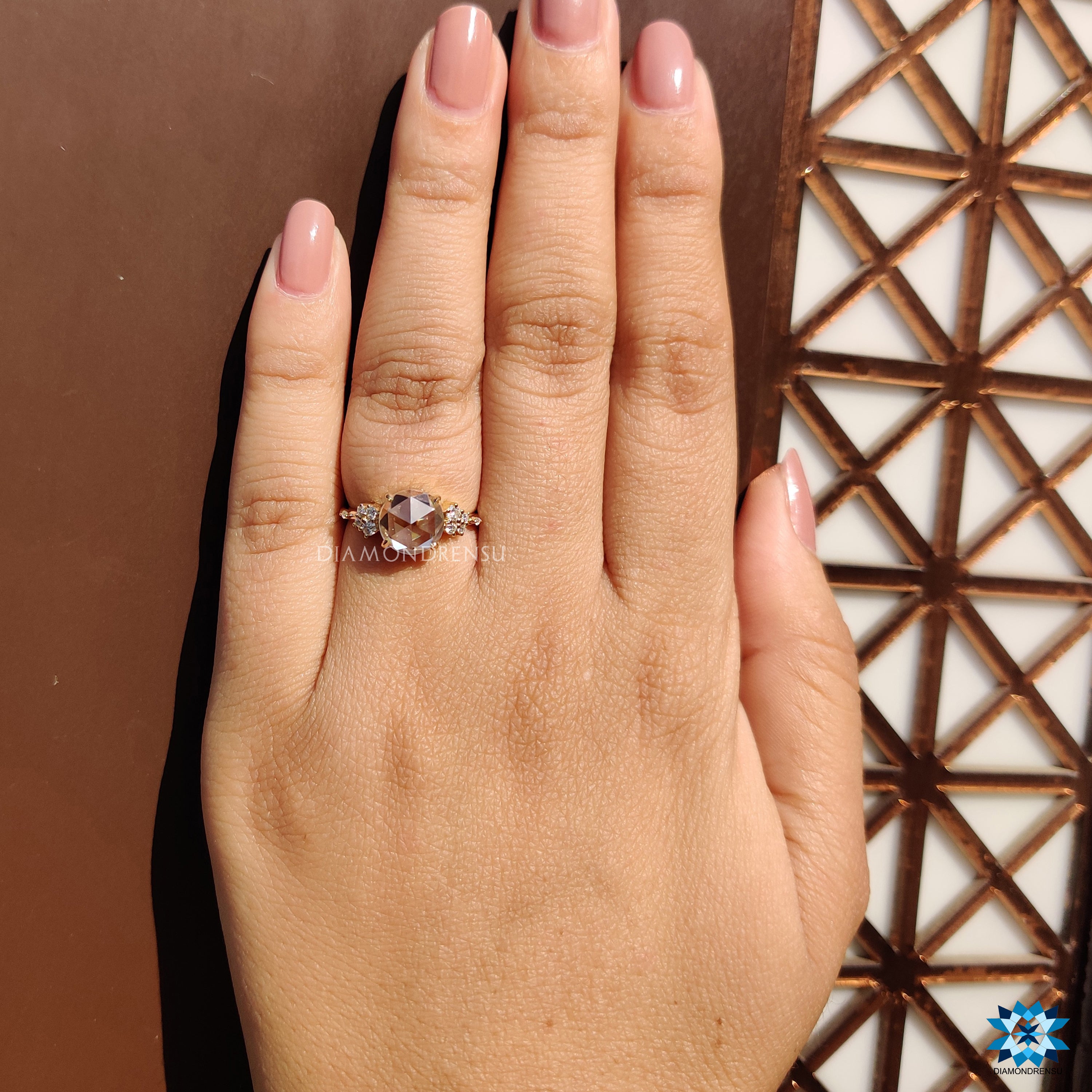 Moissanite ring UK with custom round sides and claw prong finish.
