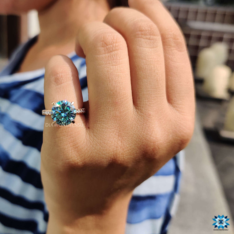 Hidden halo moissanite engagement ring in rose gold.
