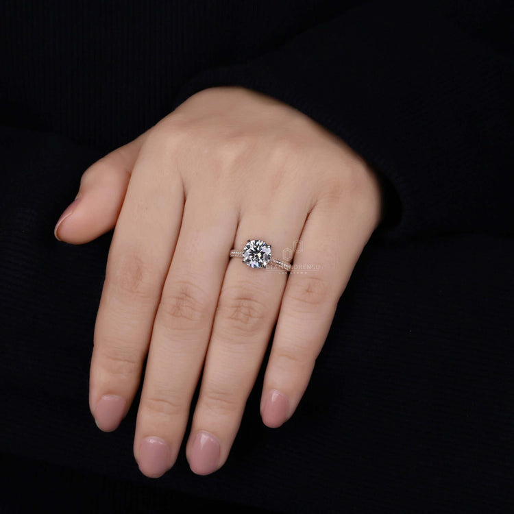 Double hidden halo ring for a bold and glamorous statement.