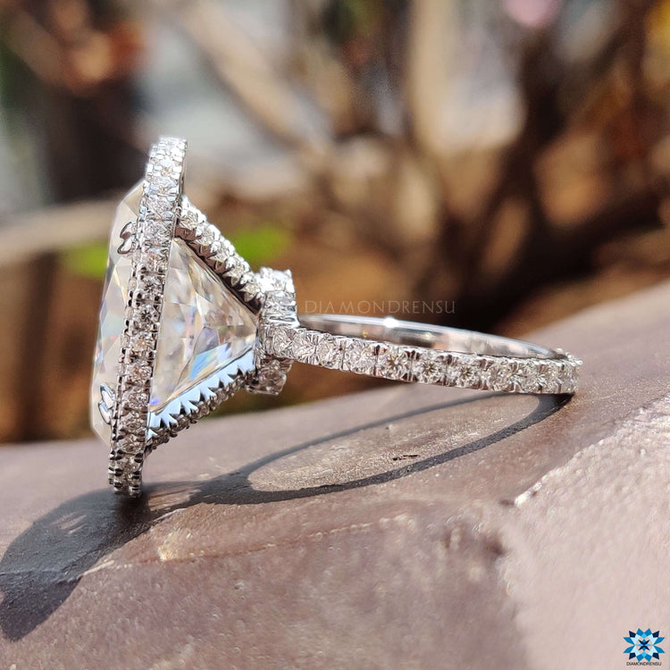 Hidden halo moissanite ring with white gold band.
