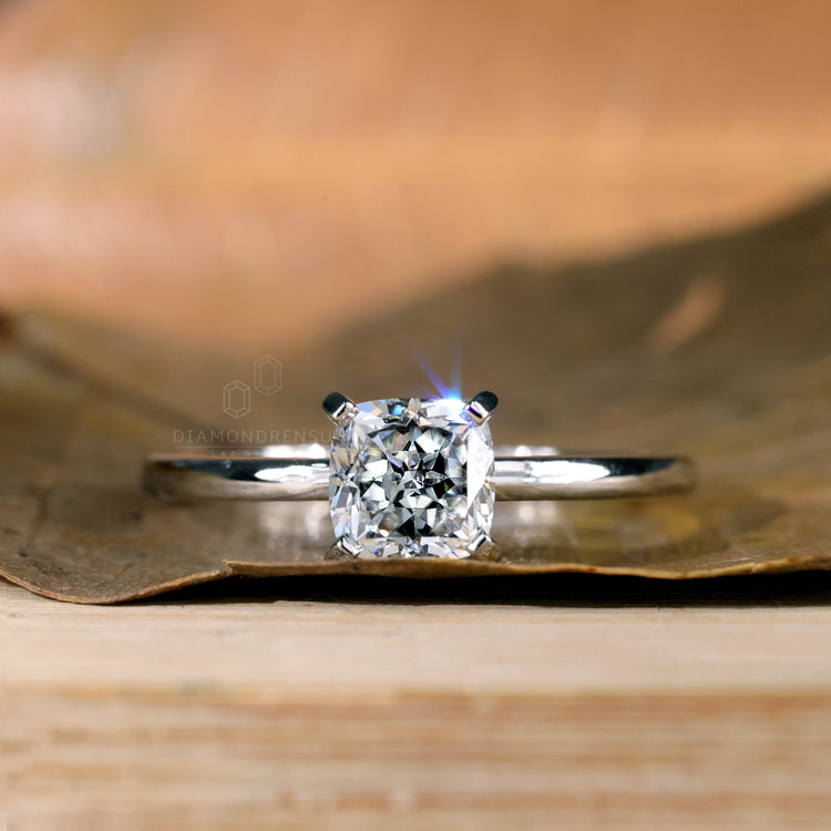 Timeless cushion ring diamond set in white gold.