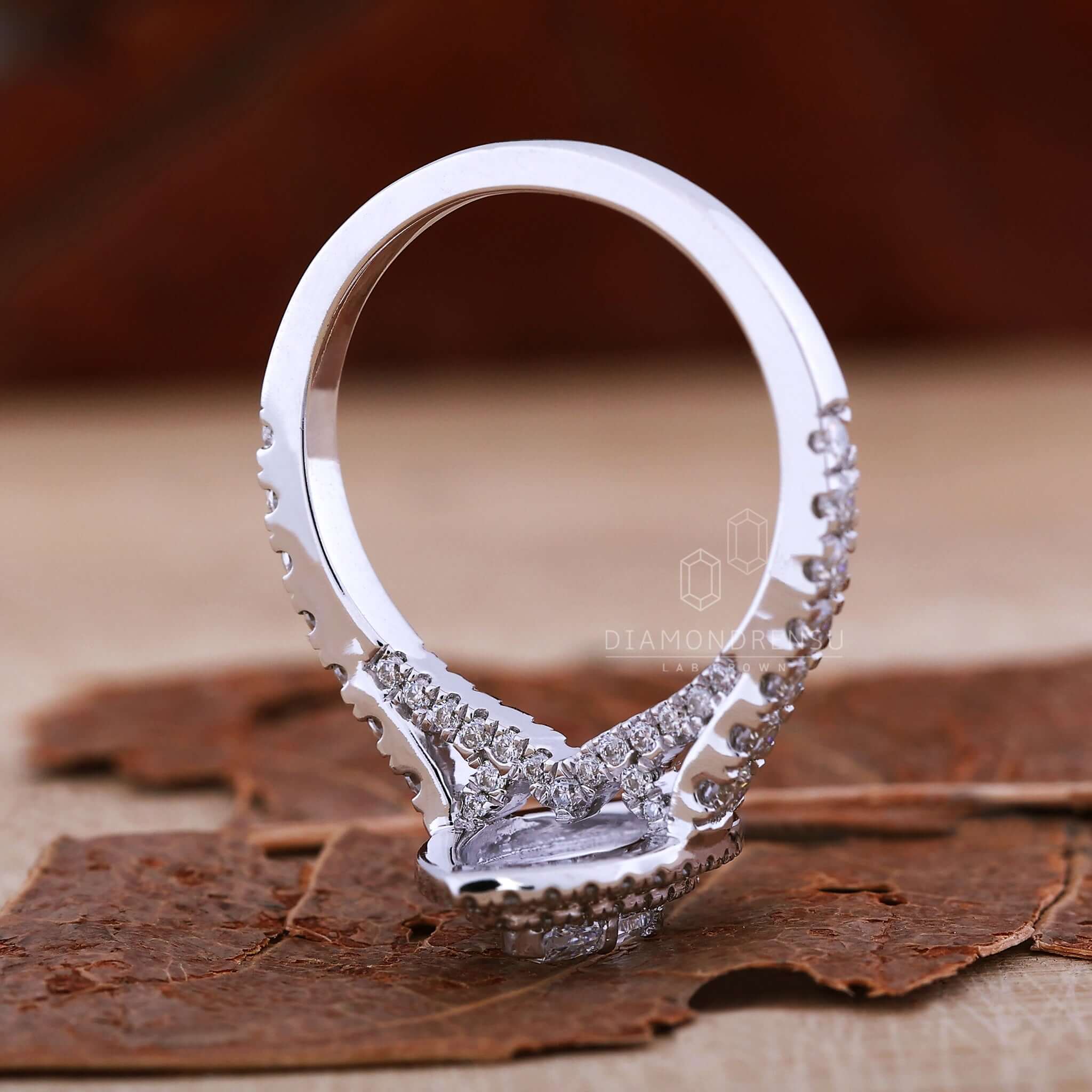 Pave ring featuring marquise diamond and cathedral ring design for a classic touch.
ment ring