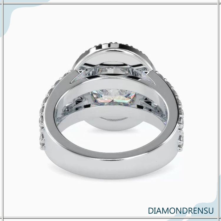 Lab grown diamond ring featuring round and baguette halo.
