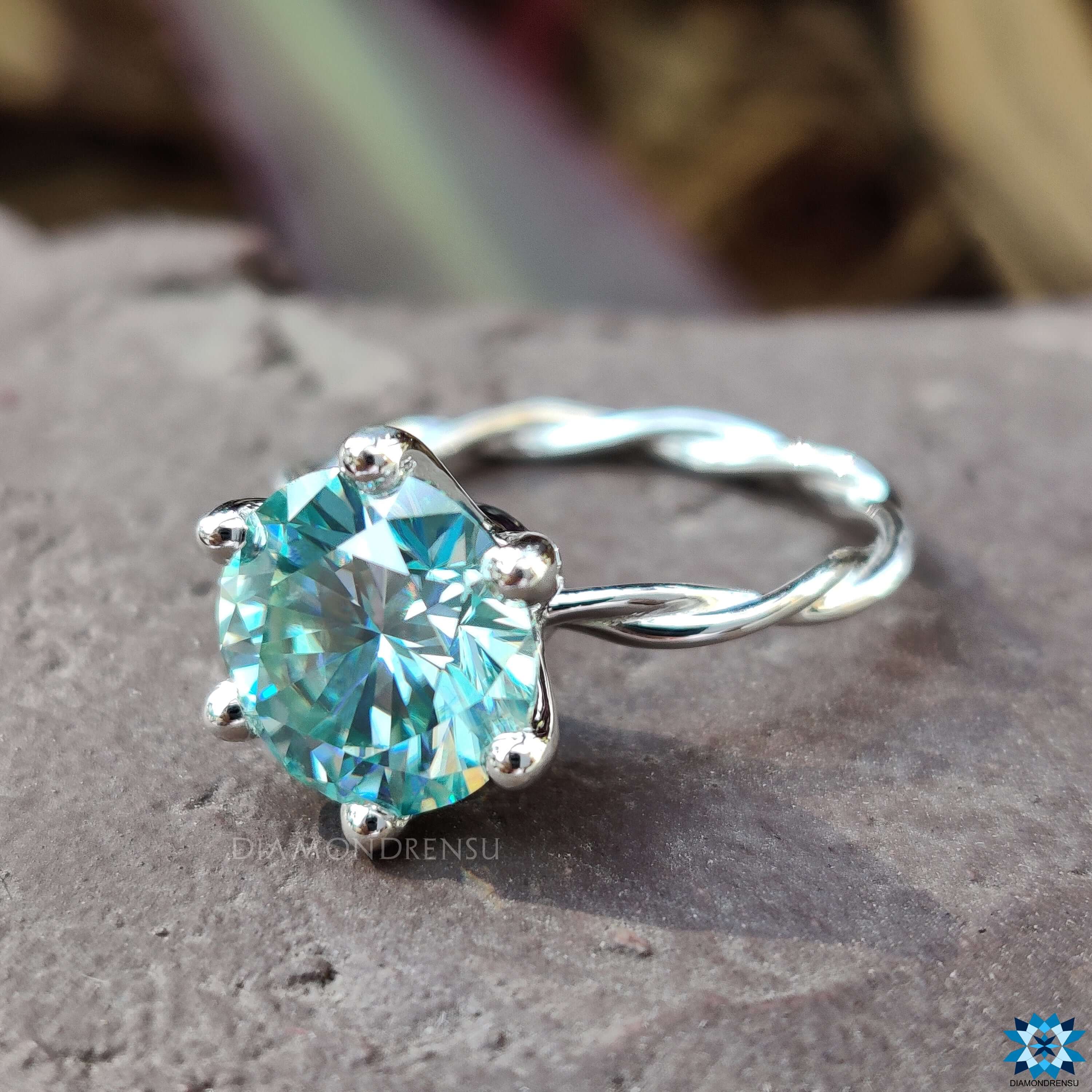 Elegant Blue Moissanite Ring, a stunning choice for a vibrant engagement.
