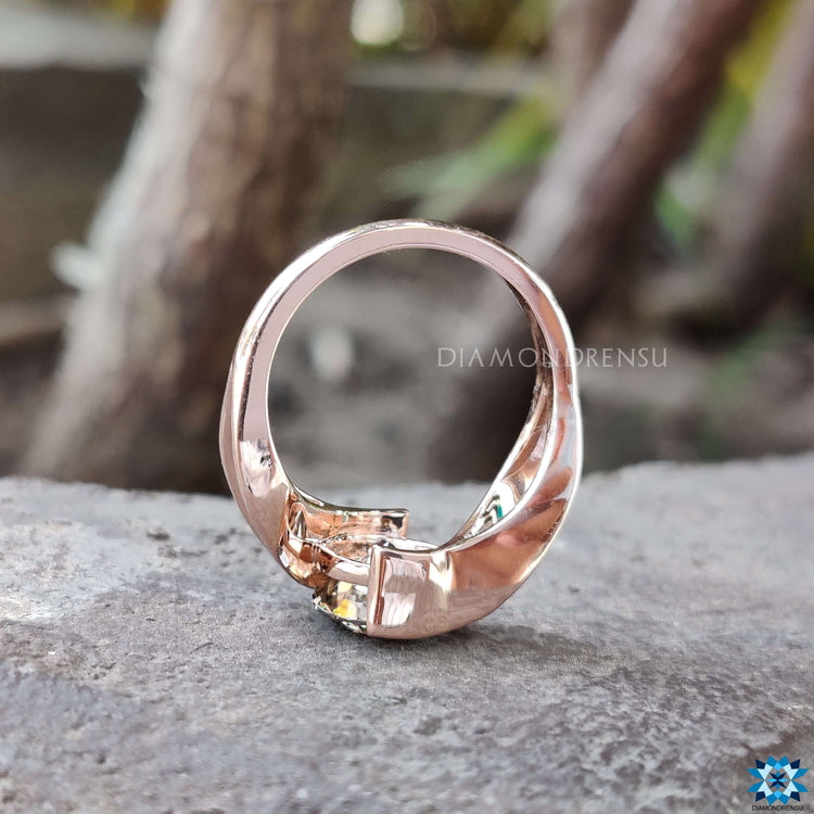 Buy custom rose gold moissanite ring with tension design.

