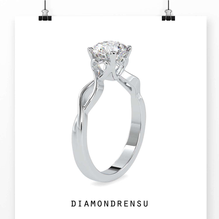 Diamondrensu UK engagement ring with heart prong.
