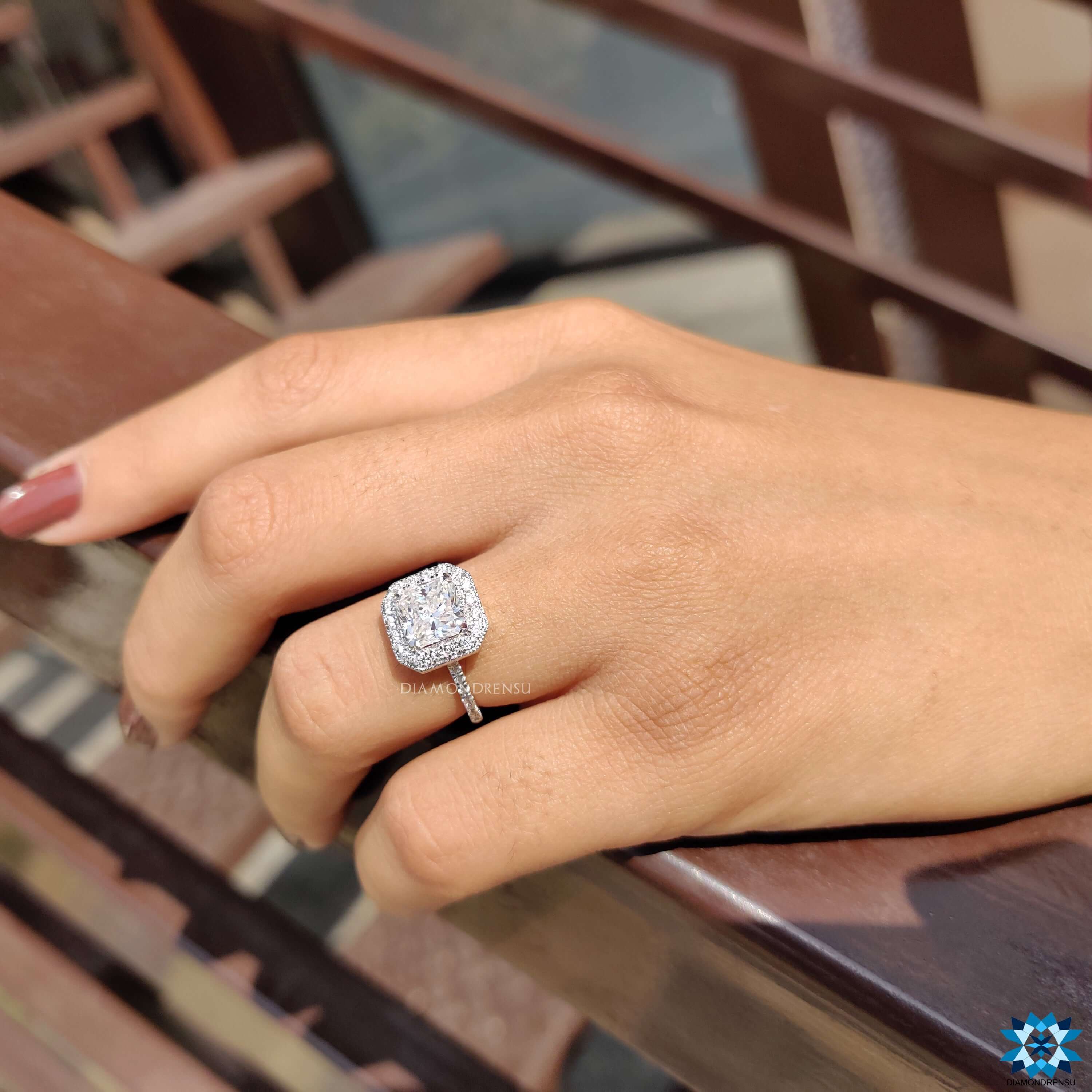 Moissanite halo ring featuring a gorgeous radiant cut moissanite ring centre stone.