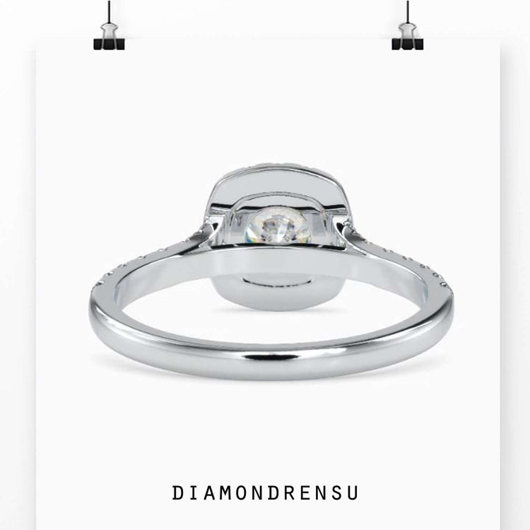 Rose gold halo ring with round cut diamonds.
