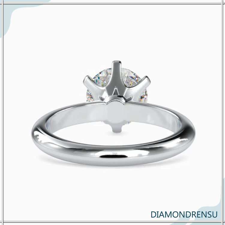 Handmade jewellery UK solitaire diamond ring.
