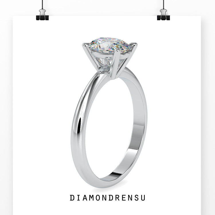 Handmade jewellery UK oval diamond ring.
