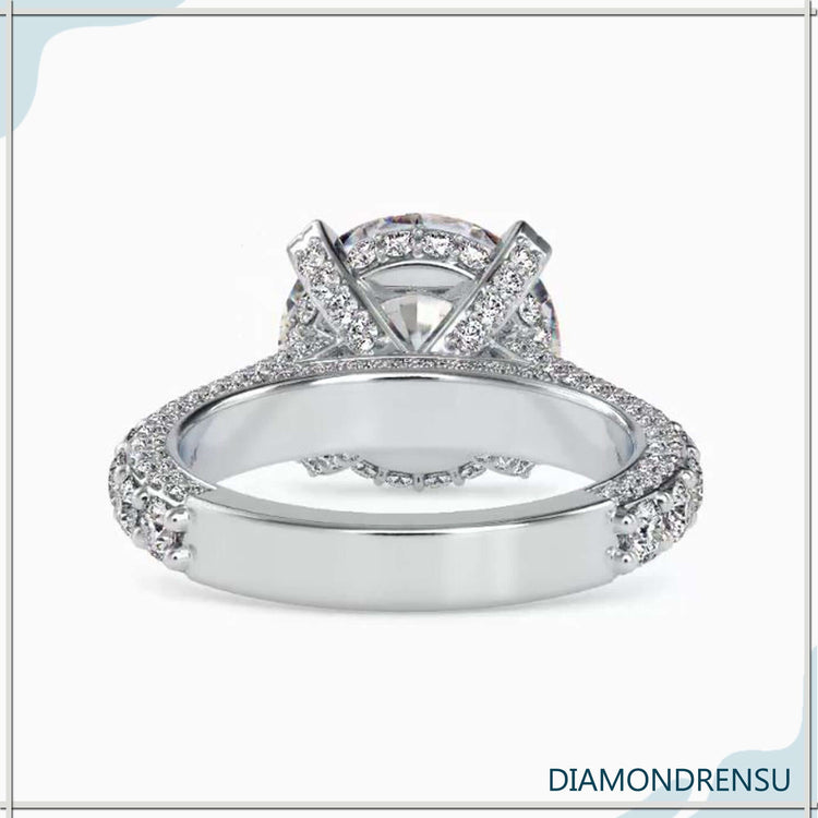 Handmade ring with double prong and lab diamond.
