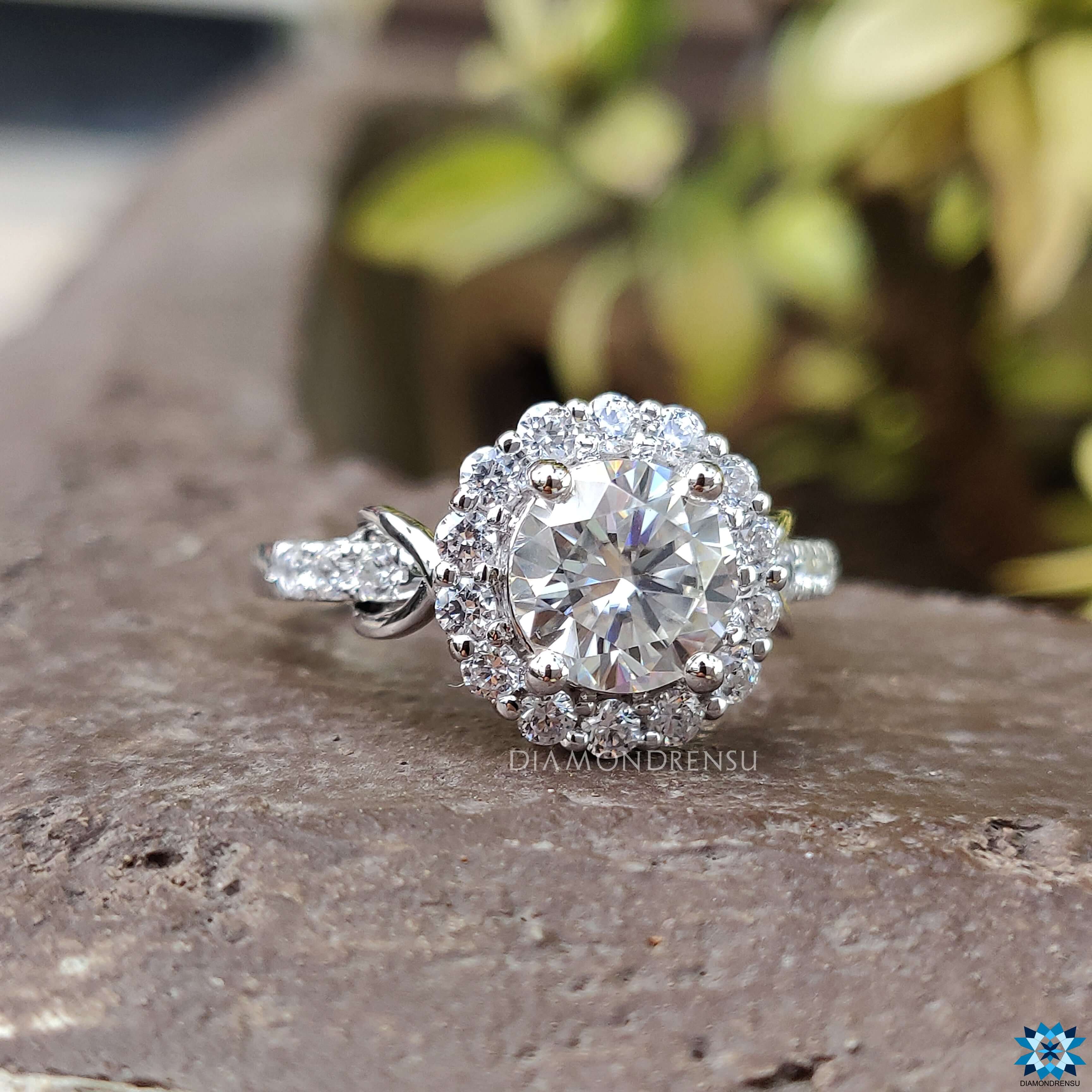 Moissanite halo ring white gold ring.