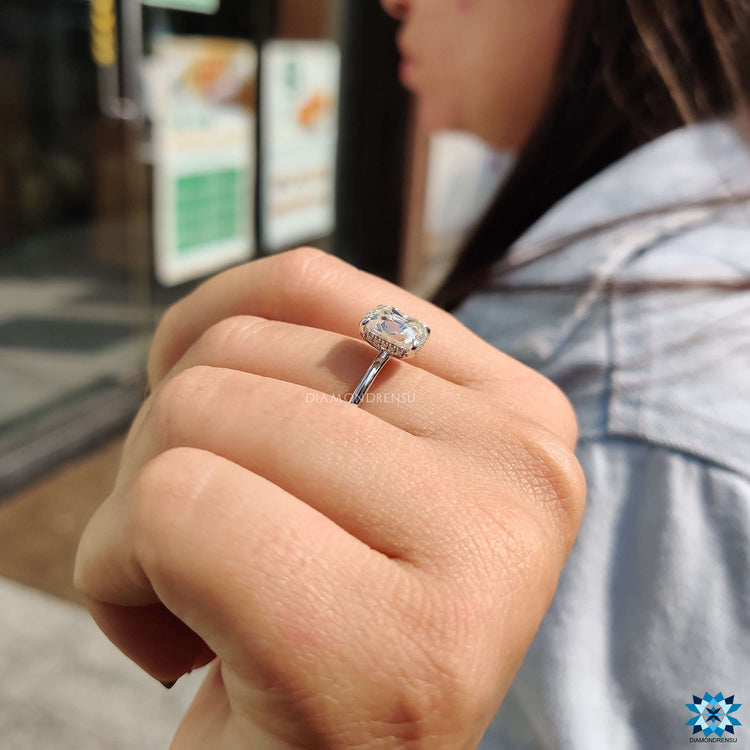 Handmade engagement ring with cushion cut moissanite.
