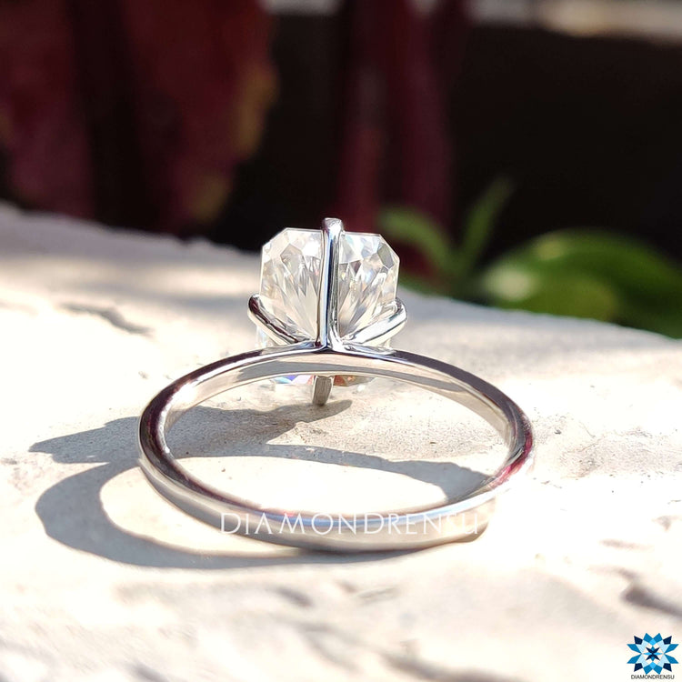 Compass prong setting white gold engagement ring.

