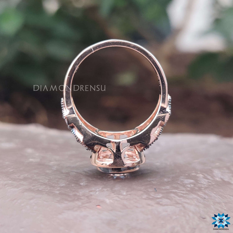 Handmade engagement ring with round old mine cut design.
