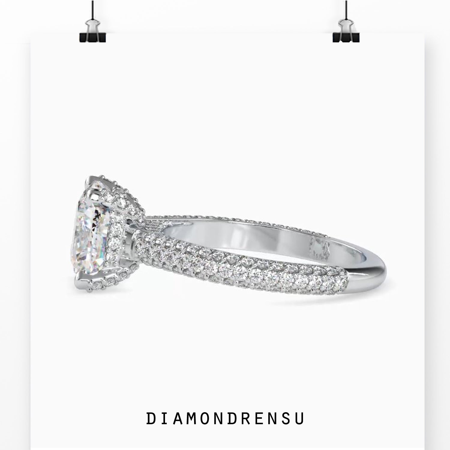 Classic diamond ring basket setting with a pave band for extra sparkle.