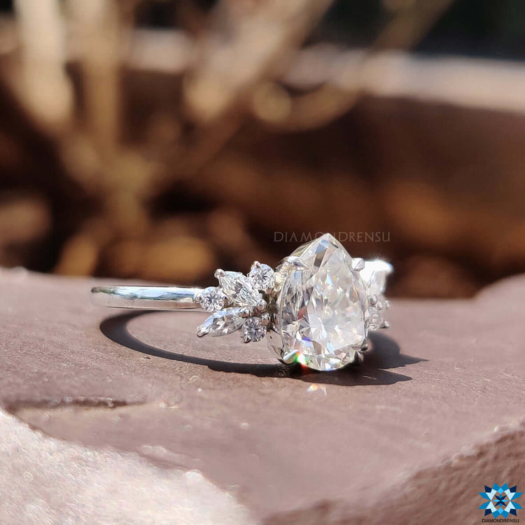 Custom engagement ring with vintage style muse setting.

